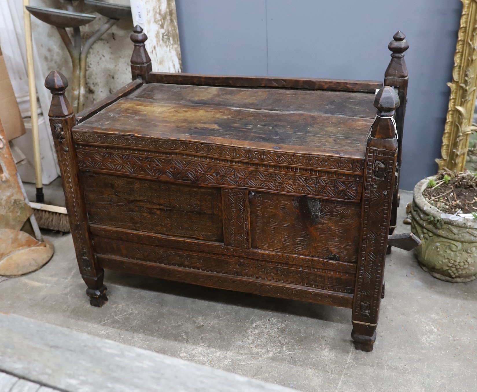 A 19th century chip carved grain chest/coffer, width 94cm, depth 52m, height 80cm (a.f.)